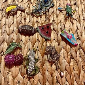 Heidi Daus Vibrant Brooch-feather sold. Corn sold. Football pickle sold.
